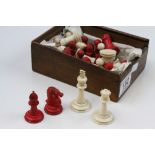 19th century bone chess set in cream and red, height of king approximately 5.5cm