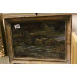A gilt frame oil painting of cattle in an extensive country landscape.