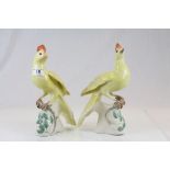 Pair of 19th Century hand painted ceramic models of Yellow birds, one marked G 19'76, the other G