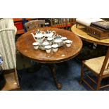 Victorian Burr Walnut and Walnut Tilt Top Oval Centre / Loo Table raised on a turned bulbous