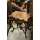 Walnut and Burr Walnut Side Table on Cabriole Legs united by a shaped Cross-stretcher