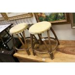 A mid 20th century pair of lusty bentwood stools with labels.