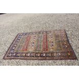 Vintage rug with lead weight tag