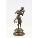 Bronze figure of a maiden playing a violin.