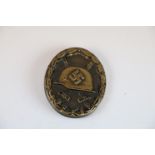 WW2 German Wound Badge With Pin And Clasp Intact To The Rear.