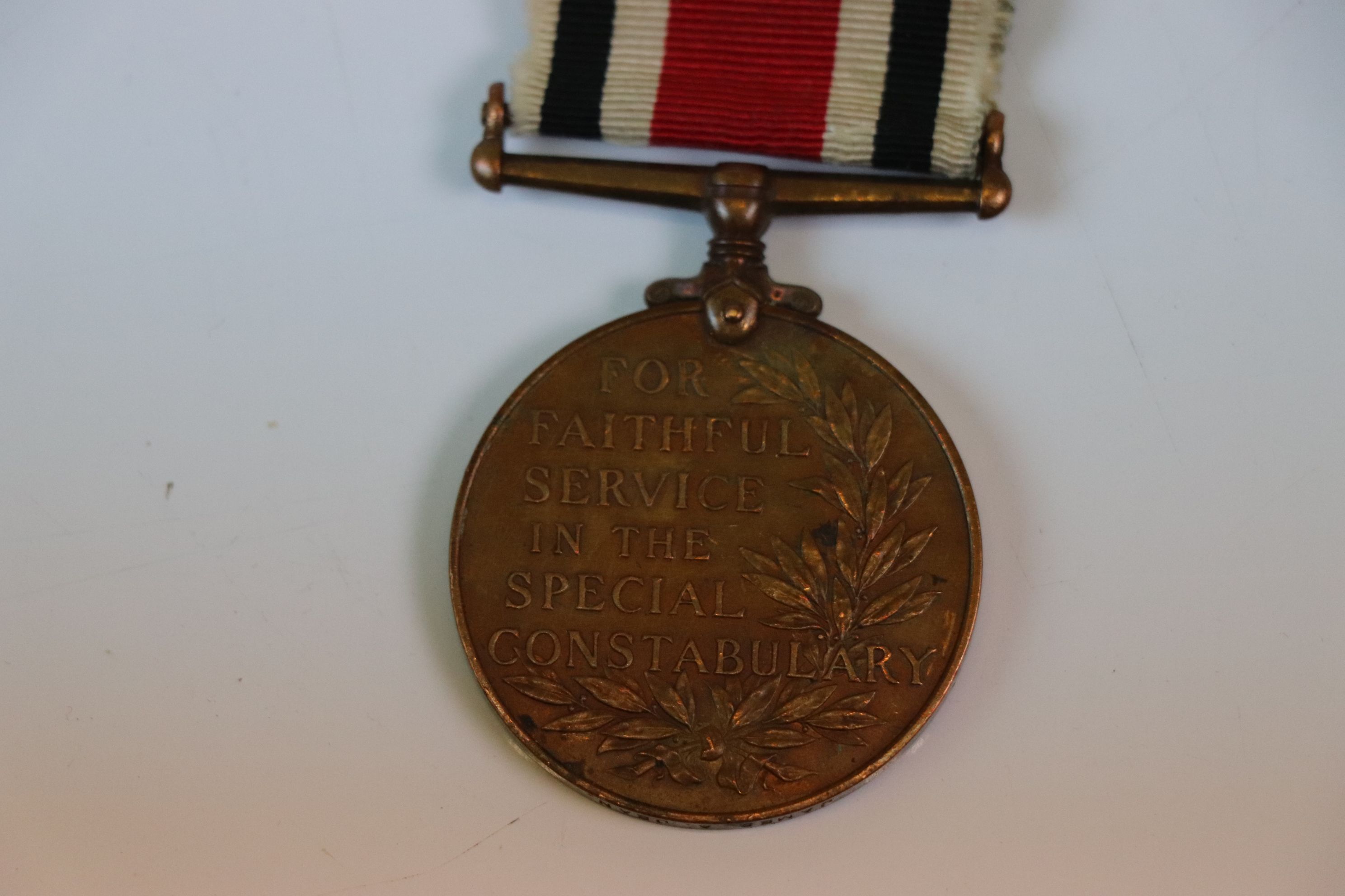 A For Faithful Service In The Special Constabulary Police Medal & Ribbon issued to James Dean.