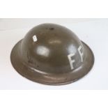 British WW2 1939 issue helmet complete with liner and strap.