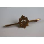 A Devonshire Regiments Sweetheart Bar Brooch Marked 9ct Gold To The Rear.