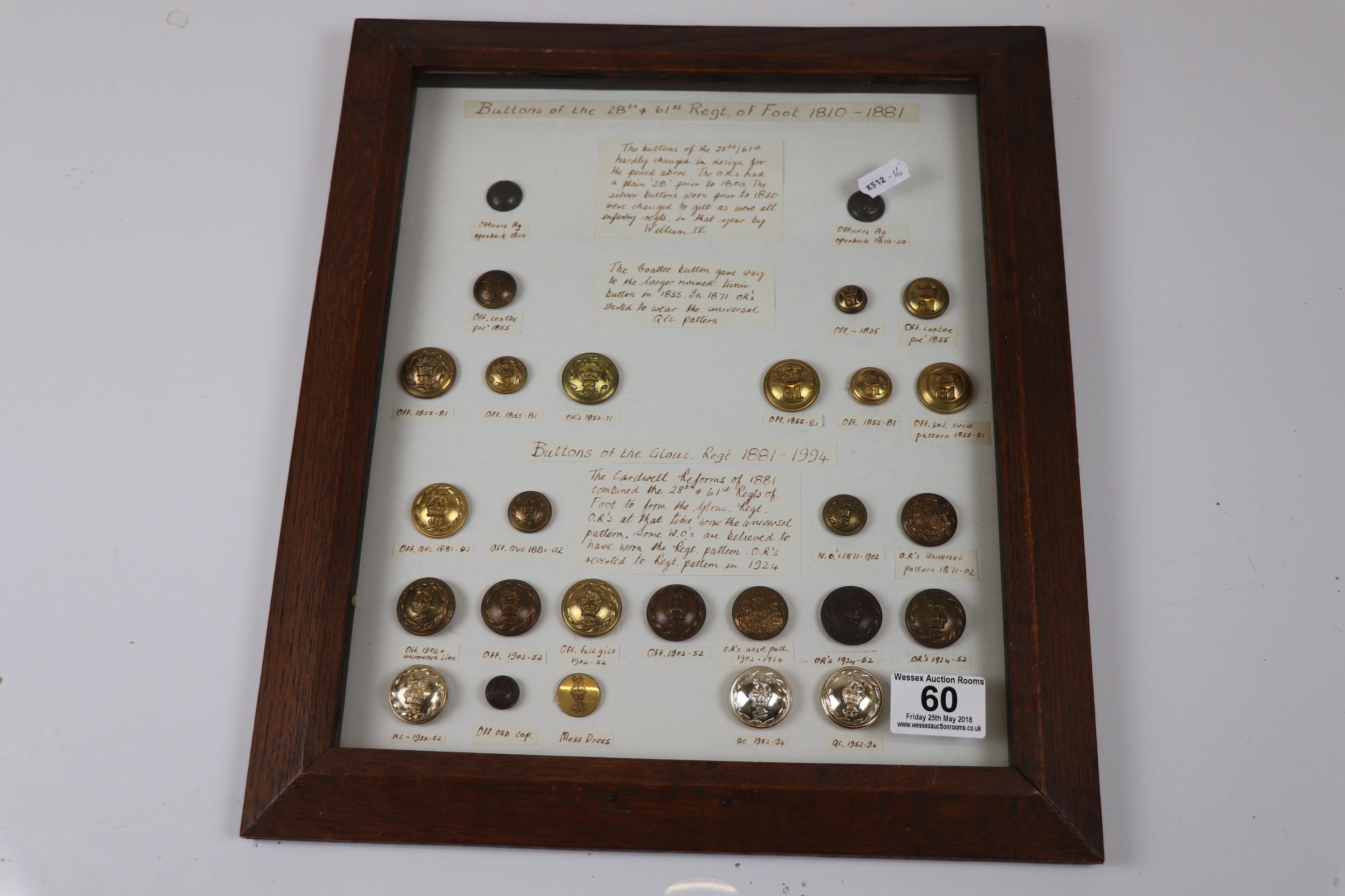 A Framed Collection of Military buttons of the 28th & 61st Regiment of Foot 1810 - 1881 and The