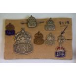 A Collection Of Eight Air Raid Patrol A.R.P. Badges To Include Silver Examples And An A.R.P. Whistle