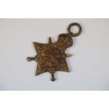 A full size British WW1 1914-1915 Star Medal issued to : 89208 GNR. T.W. MACHON. Royal Field