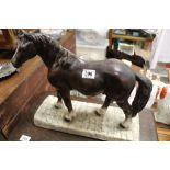 A vintage plaster model of a horse