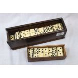 Two cased sets of vintage dominoes (2)