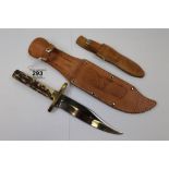 Vintage Bowie knife by J. Nowill & Sons with leather sheath. Measures 26cm approximately with a