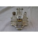 Robert & Belk silver plated condiment stand in the manner of Christopher Dresser of ball finial