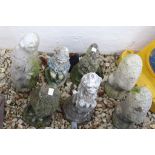 A collection of seven reconstituted stone garden ornaments