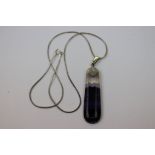 Blue John pendant necklace on silver snake link chain, the polished elongated tapered cabochon cut