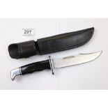 Vintage Buck 119 Bowie hunting knife with leather sheath, total length approximately 26cm with a