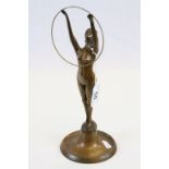 Art Deco bronze figure of a nude female with head tipped back and arms outstretched supporting a