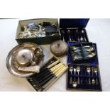 Assorted silver plate to include a pair of dwarf candlesticks, napkin ring, flatware, a compact,