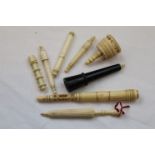 Sewing items to include bone needle cases, one in the form of a parasol together with an ebony