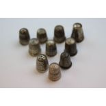 Ten silver and white metal thimbles, assorted sizes, to include makers Charles Horner, Henry