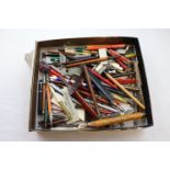 Box of vintage pens and pencils including travel sized and mottled plastic cases, writing