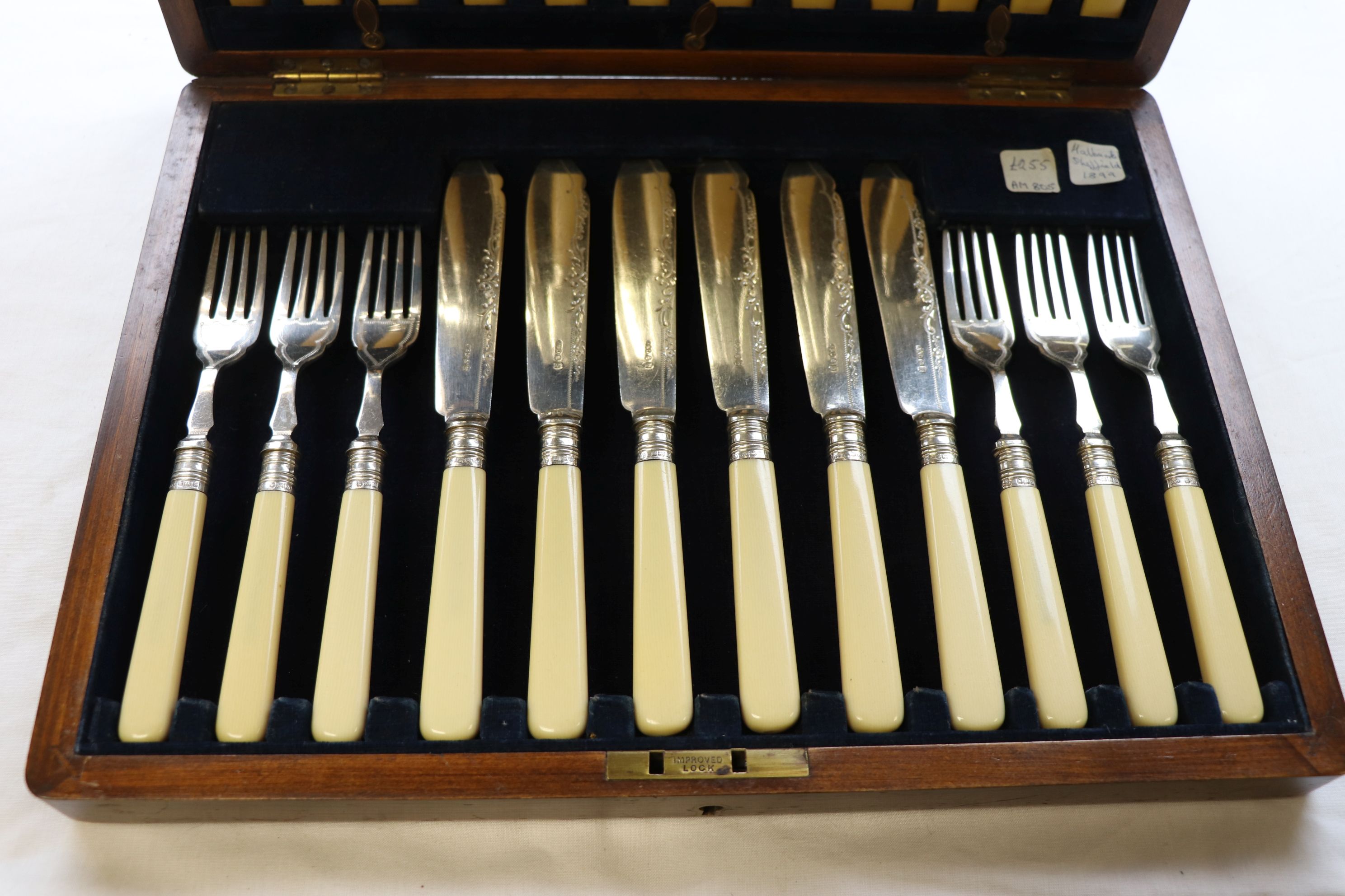 An Edwardian cased set of silver collared fish knives and forks for twelve place settings, makers - Image 2 of 3