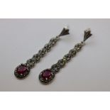 A pair of silver marcasite and CZ earrings