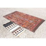 Moroccan Red, Orange & Brown Ground Rug together with a Wool White, Black and Brown Ground Rug