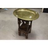 Anglo-Indian Carved Hardwood Small Table with Mother of Pearl Inlay and Oval Brass Tray Top