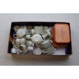 Miniature part tea services in white porcelain together with a small quantity of stone and glass