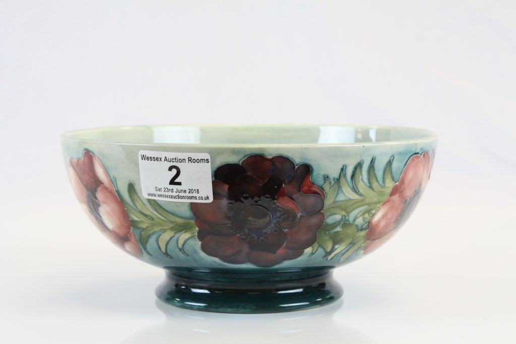 Moorcroft Anemone pattern bowl, green ground with red and purple anemone decoration, mid 20th - Image 2 of 4