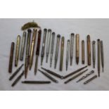 Various propelling pencils and travel pencils to include white metal, plated etc