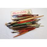A collection of vintage quills with wooden, bone and plastic handles, approximately 40 (q)