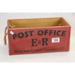 A wooden trugg box marked post office