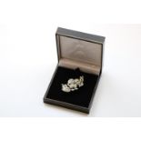 An impressive 18ct white gold diamond spray brooch set with over 100 diamonds, approx 3cts