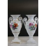Pair of twin handled ceramic Vases with hand painted floral design and crossed sword Meissen type