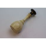 Bone handled wax seal, the handle of inverse baluster form, the seal formed of a series of points,