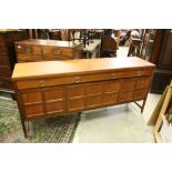 Retro Nathan Teak Sideboard, the three drawers with drop ring handles, central fallfront panel
