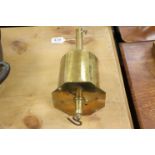 A brass cased revolving spit roaster