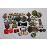 Circa 1920s/1930s buttons and buckles to include Art Deco striped plastic oval buttons with