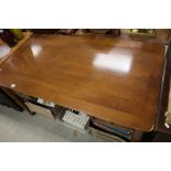 Teak Desk with Central Drawer flanked either side by two drawers raised on turned legs
