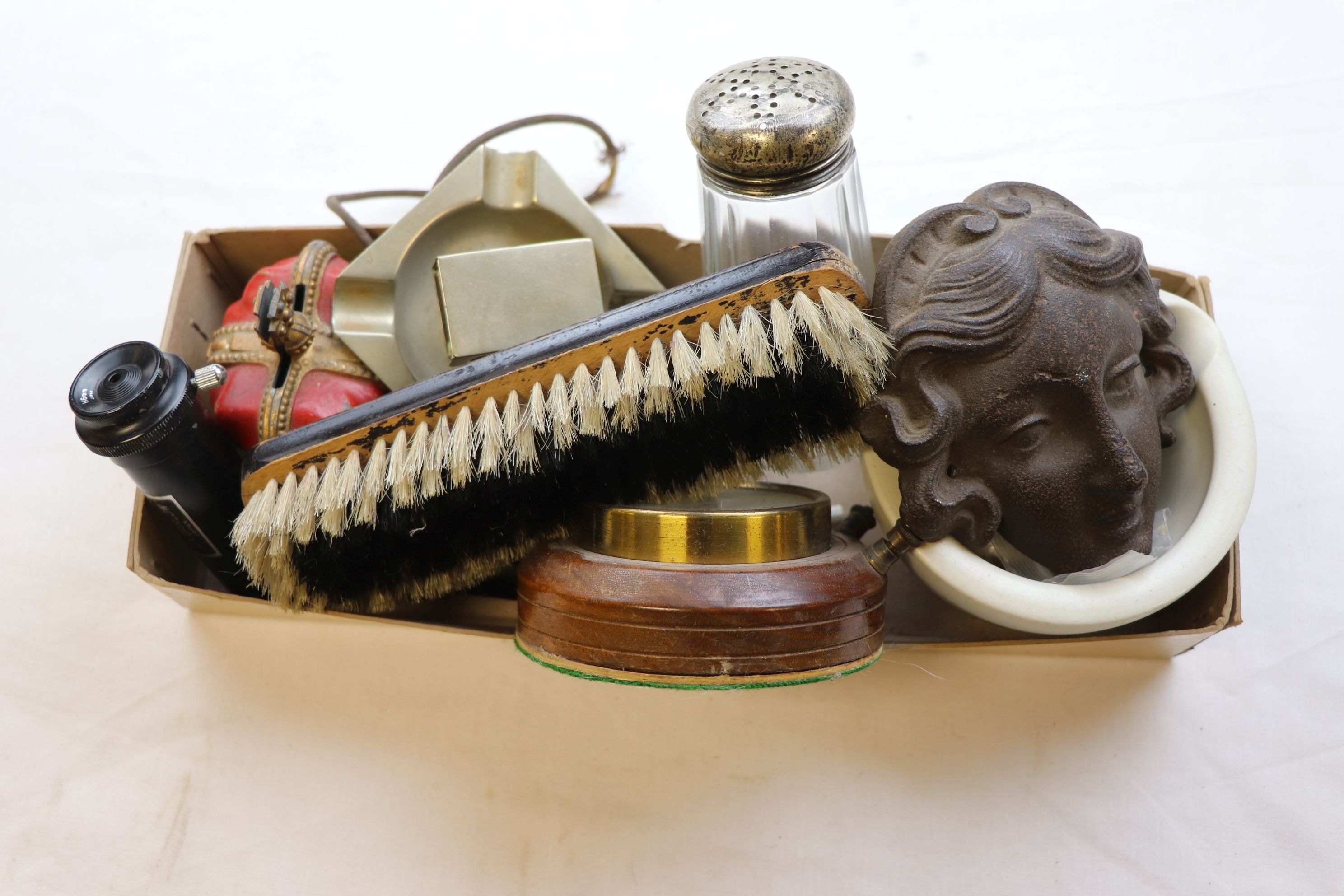 Mixed items to include brush with silver initials, silver topped sugar sifter, ashtray, egg shaped