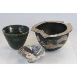 Three Studio Pottery bowls, one with painted Female & Bees design and marked to base AM 2005