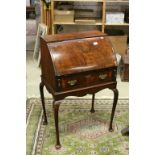 Queen Anne Style Walnut Barrel Front Bureau with fitted interior, single drawer and raised on