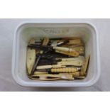 Vintage sewing items to include mother-of-pearl, bone and plastic handled crochet hooks, bobbins,