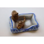 A Dresden pin dish in the form of two kittens at play