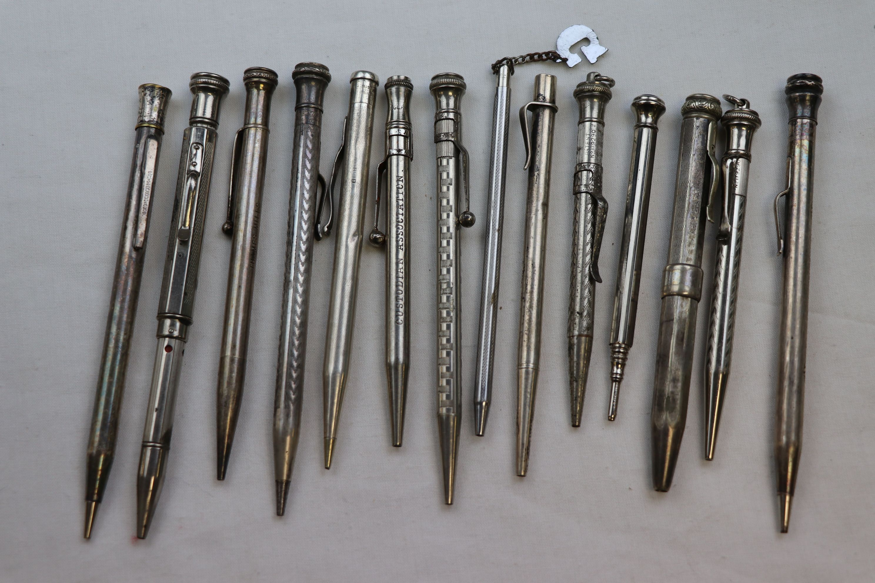 Collection of white metal propelling pencils including blue paste inset propelling pencil engraved - Image 3 of 3