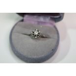 A white gold single stone diamond ring of approx 25 points